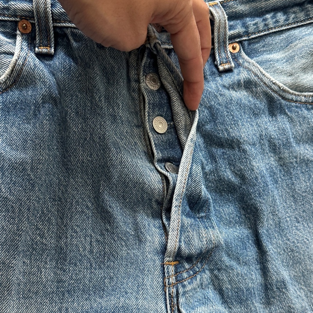 Levi's Blue Denim Mini Skirt with Floral Ruffle

Super cute! - Picture 3 of 5
